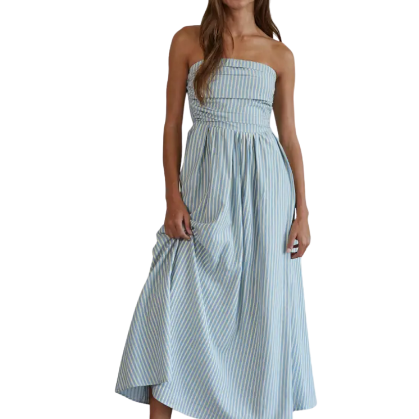 Woman wearing a light blue striped dress on a white background