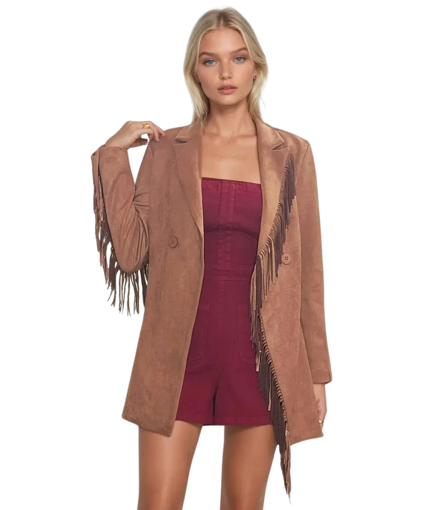 Woman wearing a brown suede jacket with fringe details OVER A BURGUNDY GARNET ROMPER on a white background