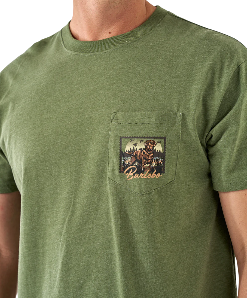 Green t-shirt with a pocket design featuring a bear and text on a white background