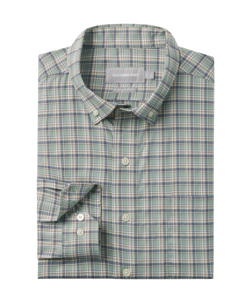 Folded plaid shirt with a visible brand label on a white background