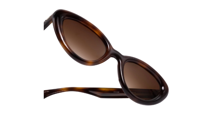 Krewe sunglasses with tortoiseshell frame and brown lenses on a white background