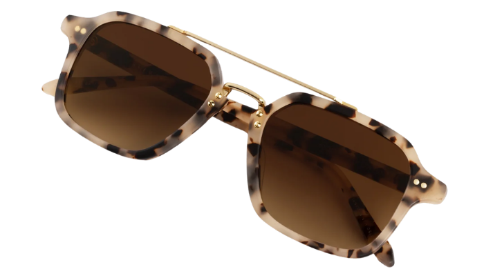 Krewe sunglasses with tortoiseshell frame and brown lenses on a white background