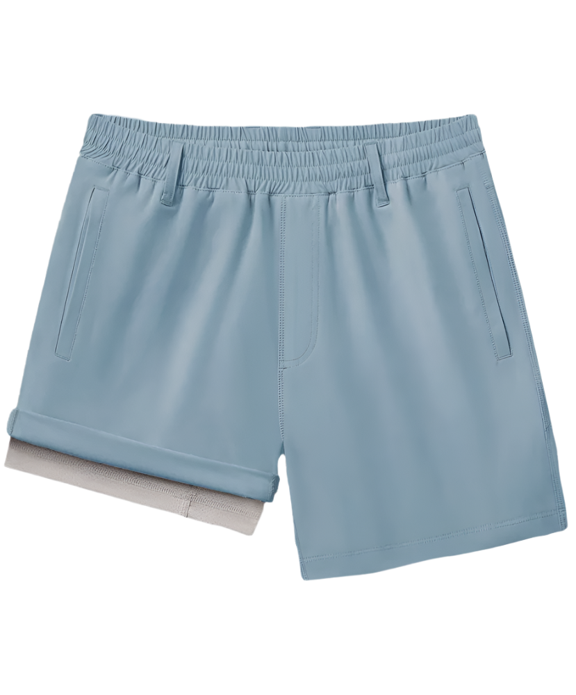 A pair of blue everyday hybrid shorts 2.0 with a built-in liner, water-repellent finish, and a fully elastic waistband with a reversible drawstring.