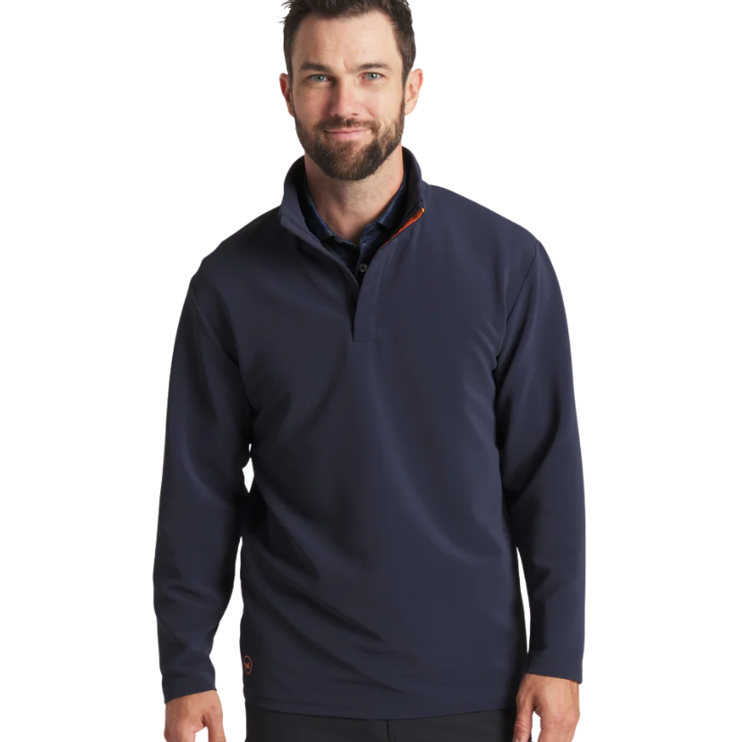 Man wearing a navy blue pullover with a white background