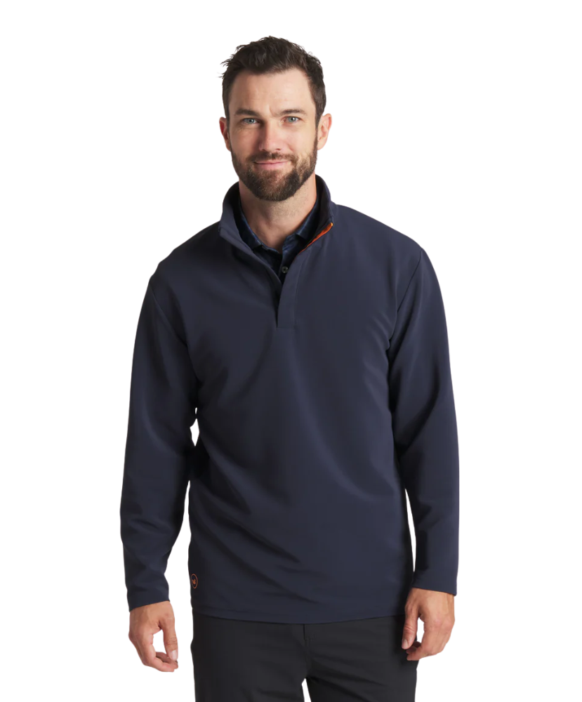 Man wearing a navy blue pullover with a white background