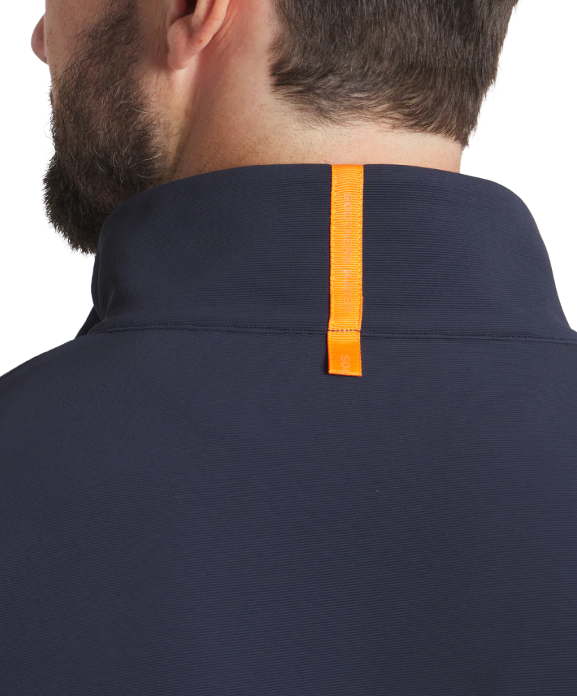 Man wearing a navy blue pullover with a white background