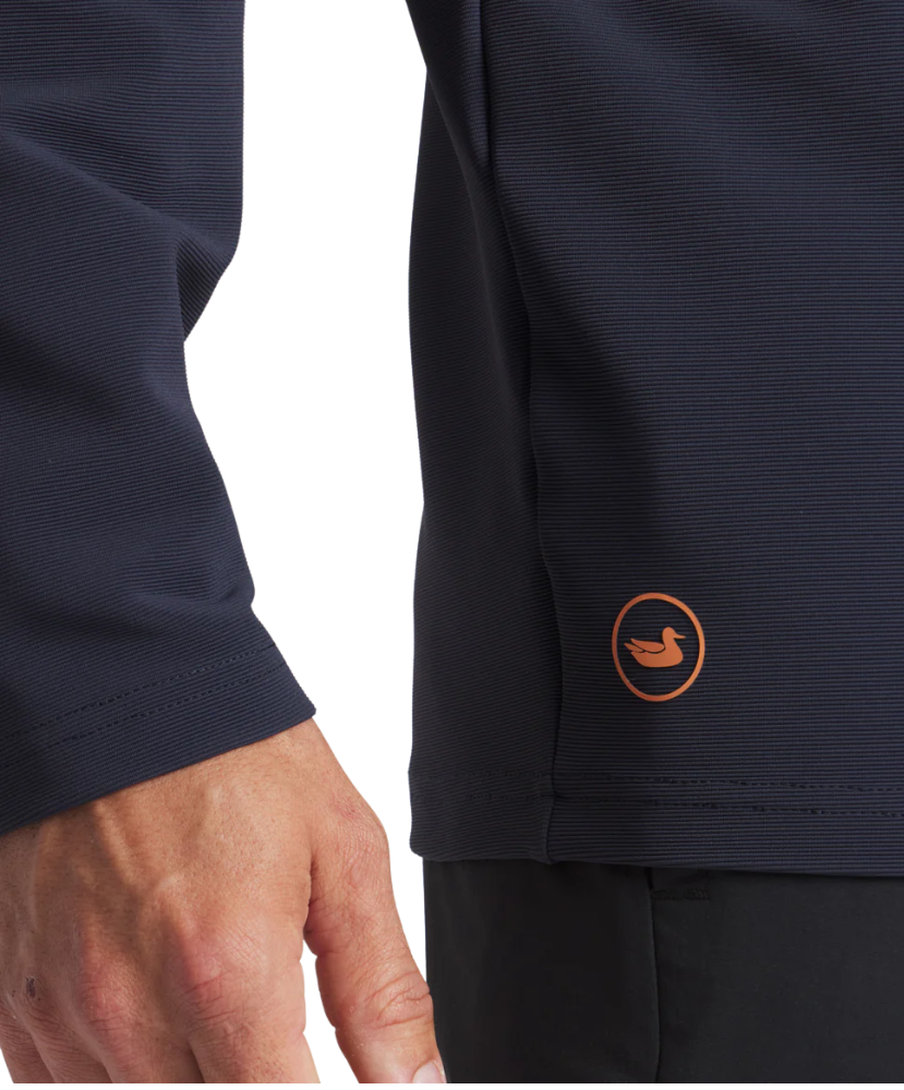 Navy blue jacket with a logo on the chest against a white background