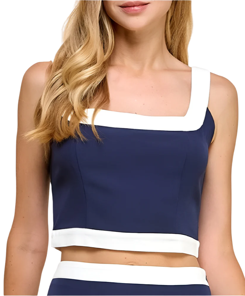 Navy and white sleeveless top worn by a model on a white background
