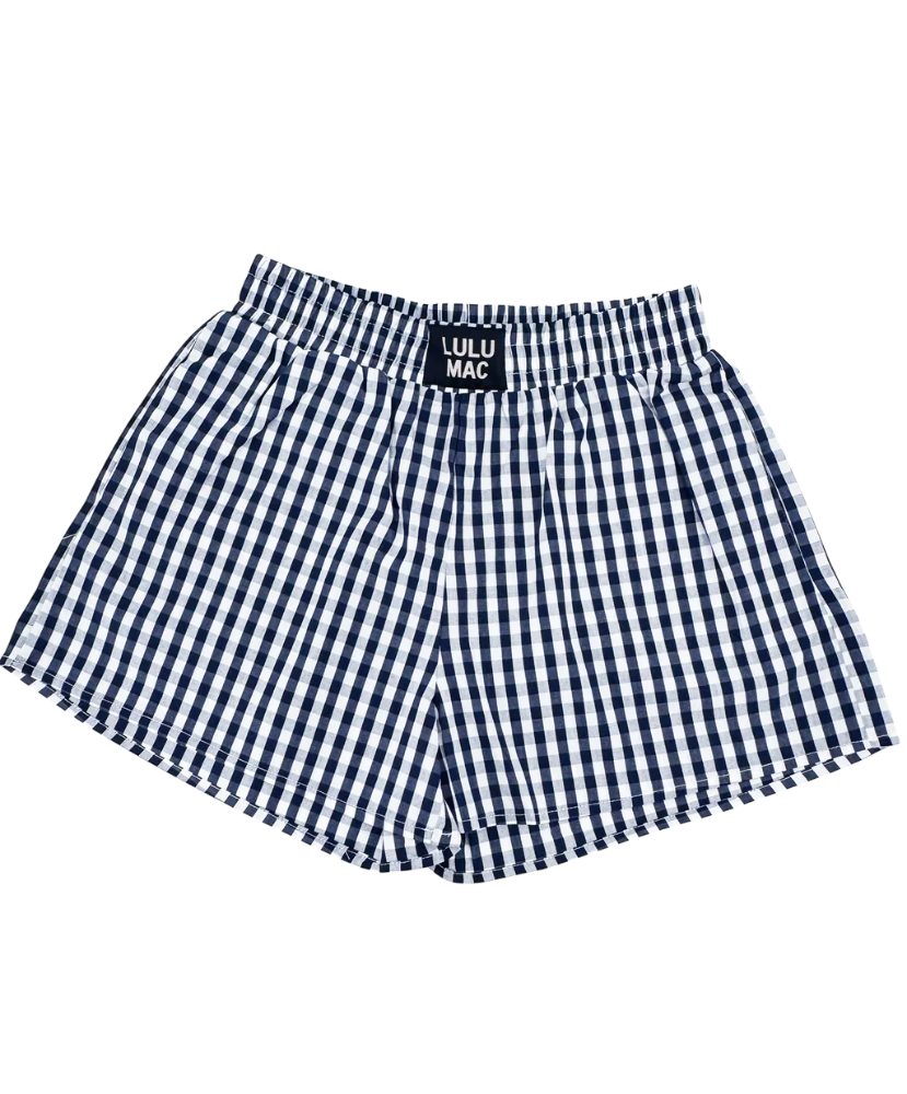 Navy and white checkered shorts with 'Lulu Mac' branding on a white background