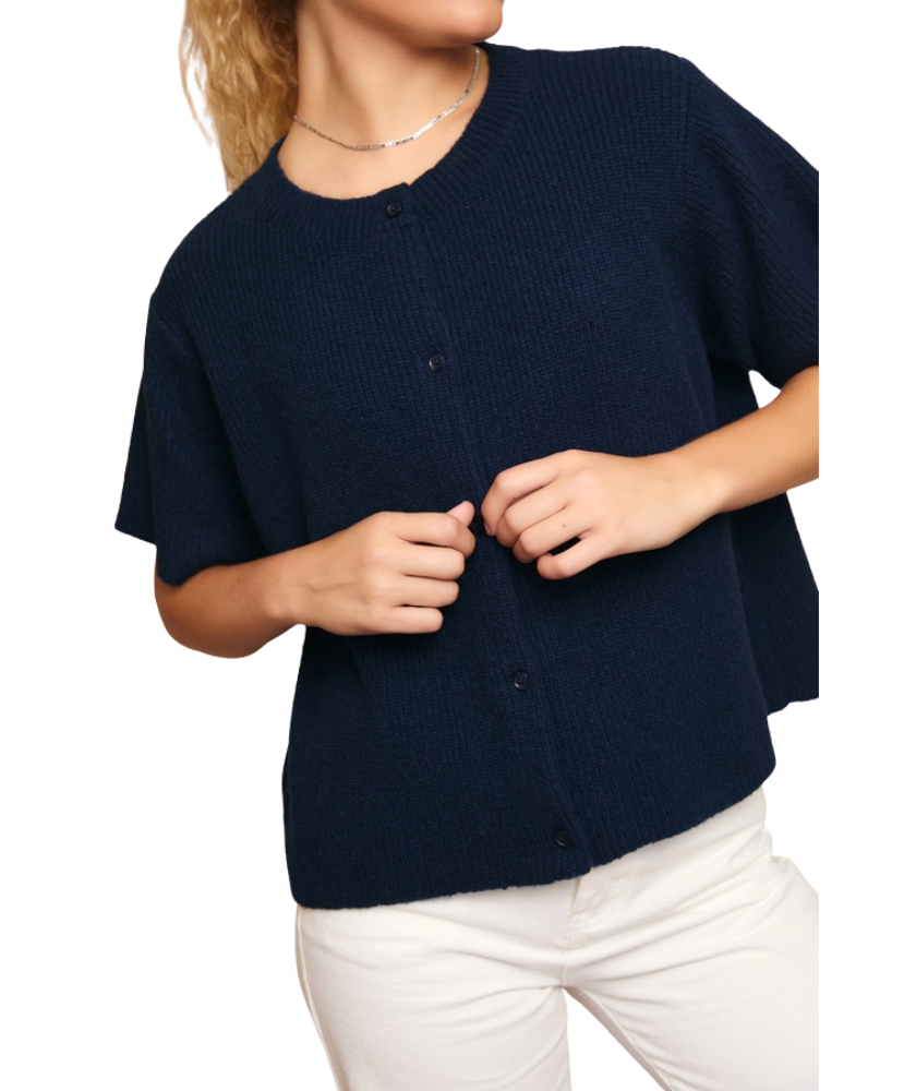 Navy blue cardigan worn by a person on a white background