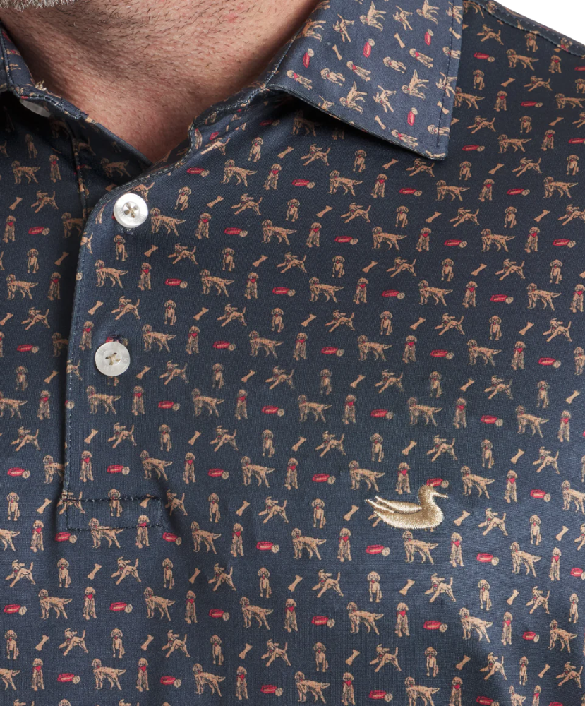 Close-up of a navy blue shirt with dog pattern