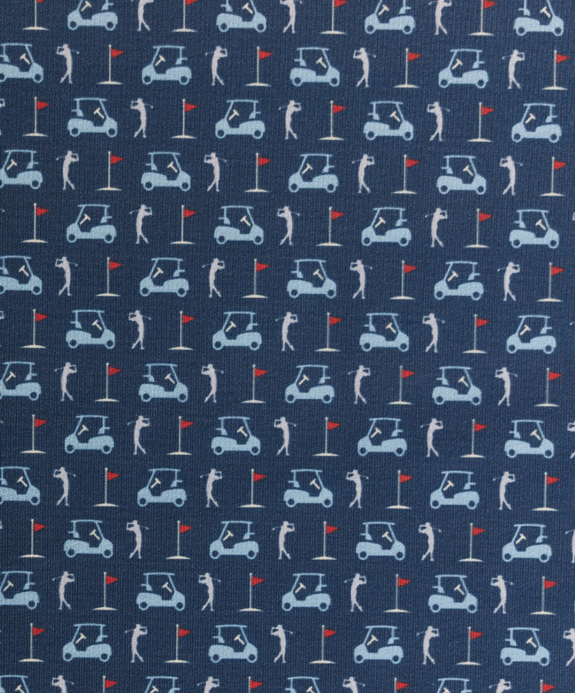 Golf-themed fabric pattern on a polo with golf carts, flags, and players on a blue background