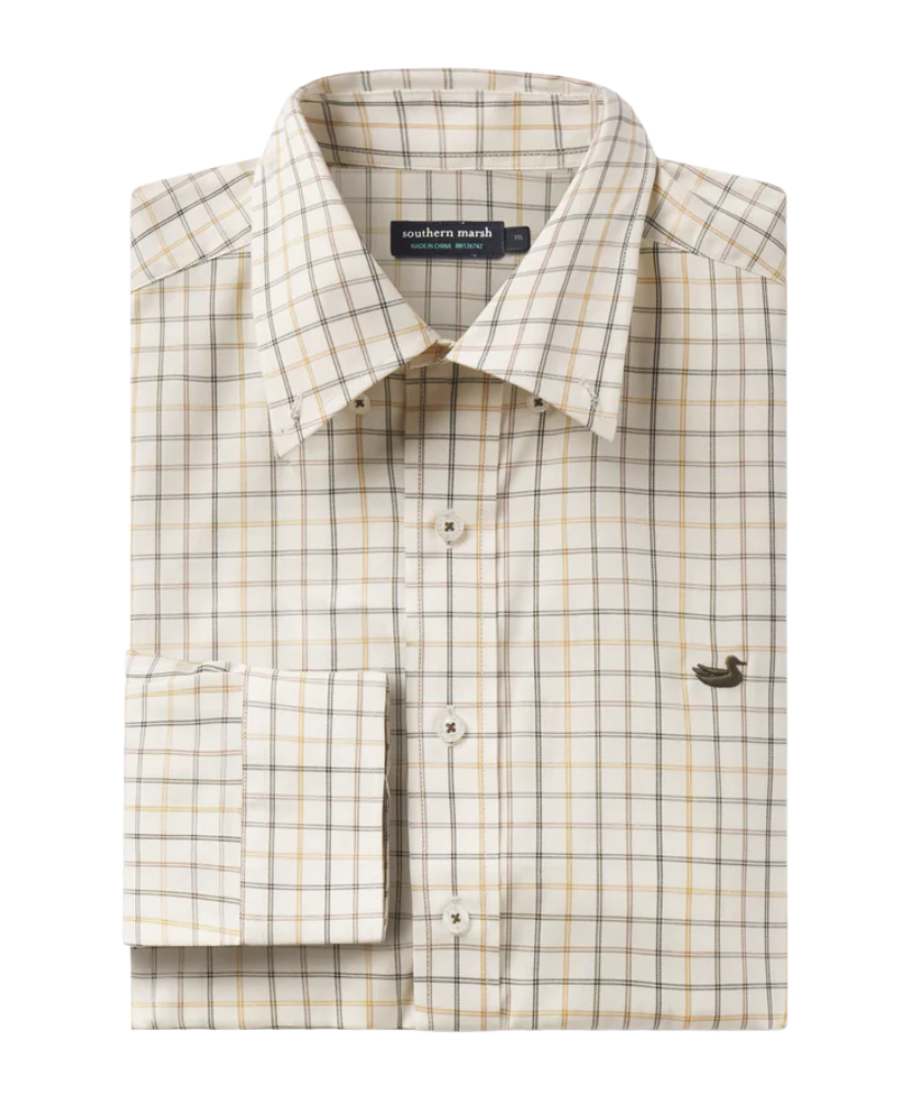 Folded plaid shirt with a visible brand label on a white background