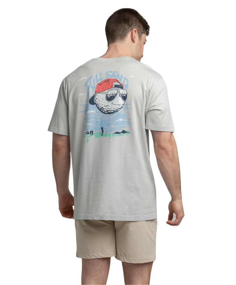 Man wearing a gray t-shirt with a graphic design on the back, standing against a white background