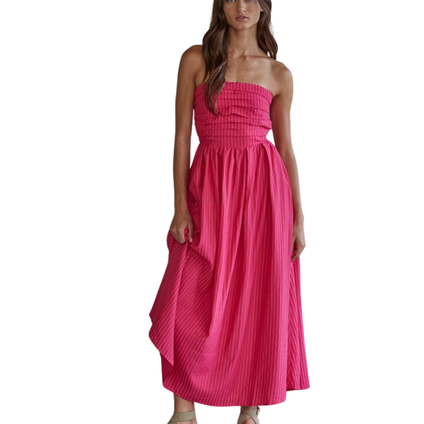 Woman wearing a pink strapless dress on a white background