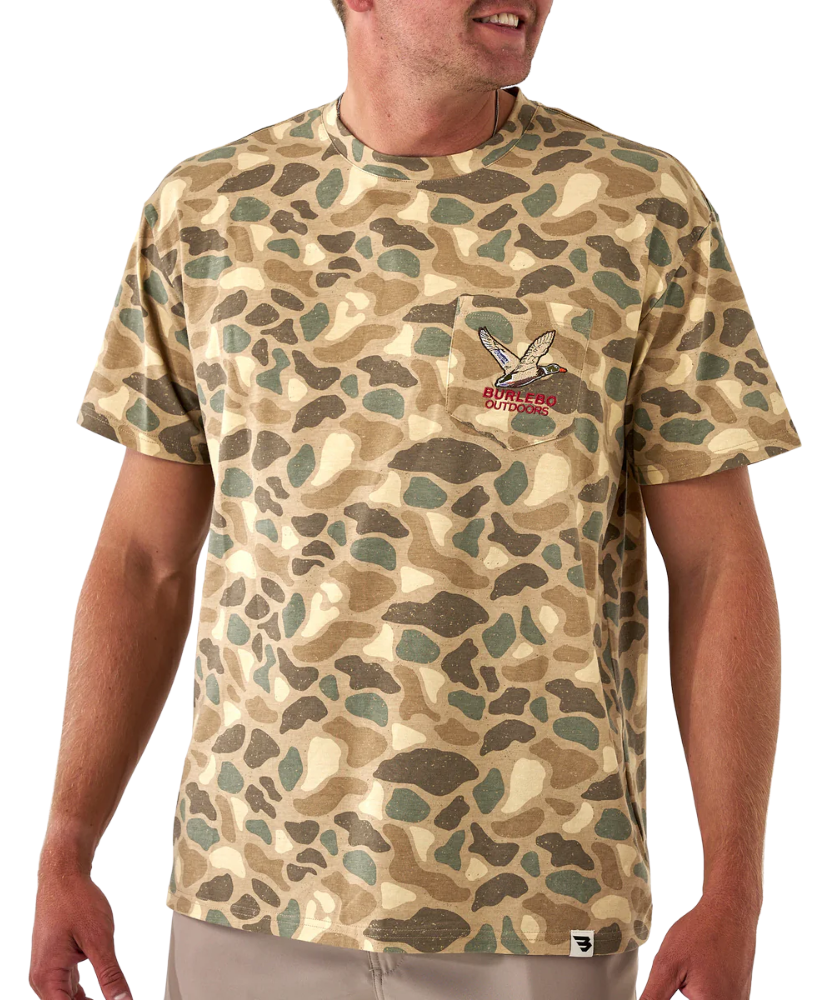 Person wearing a camouflage t-shirt with a logo on a white background