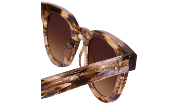 Krewe tortoiseshell sunglasses with brown gradient lenses on a white background