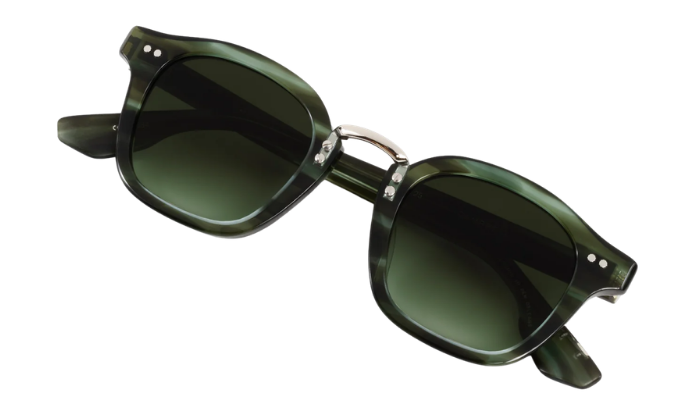 Green Krewe sunglasses with a white background