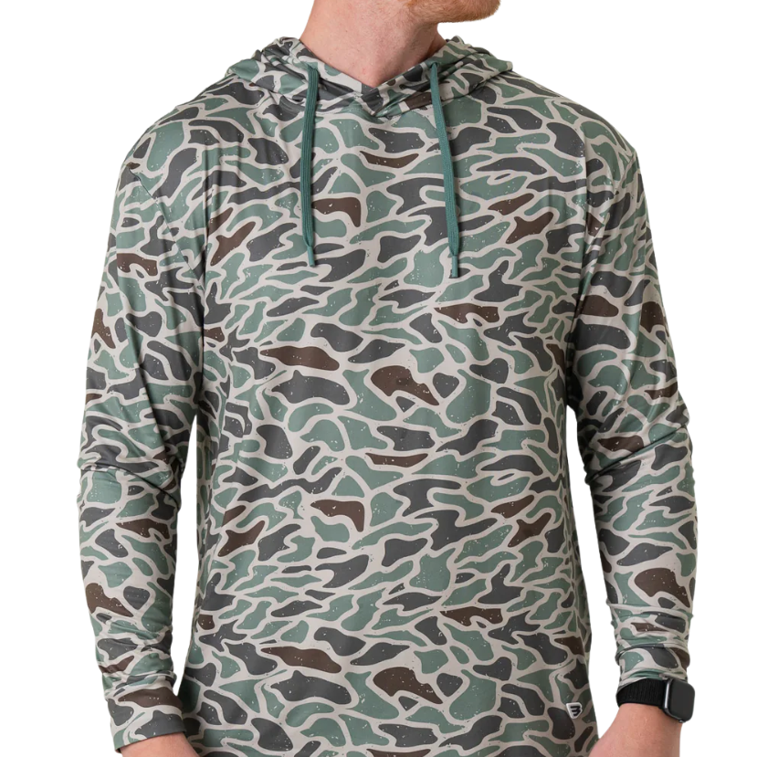 Person wearing a RETRO DUCK camouflage hoodie on a white background