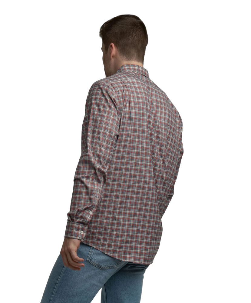 Man wearing a plaid shirt and jeans on a white background