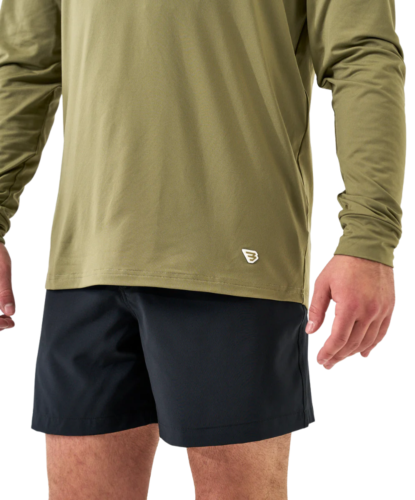 Man wearing a green hoodie on a white background