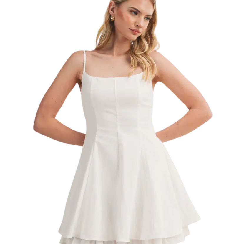 Woman wearing a white dress on a white background