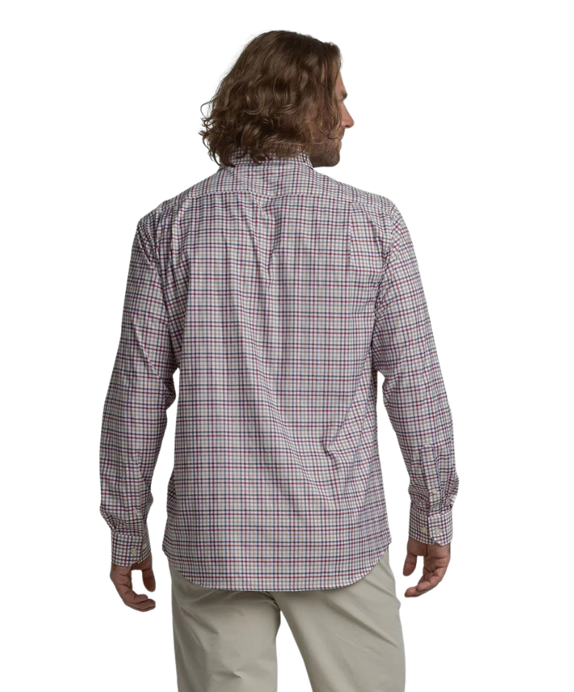 Man wearing a plaid shirt on a white background