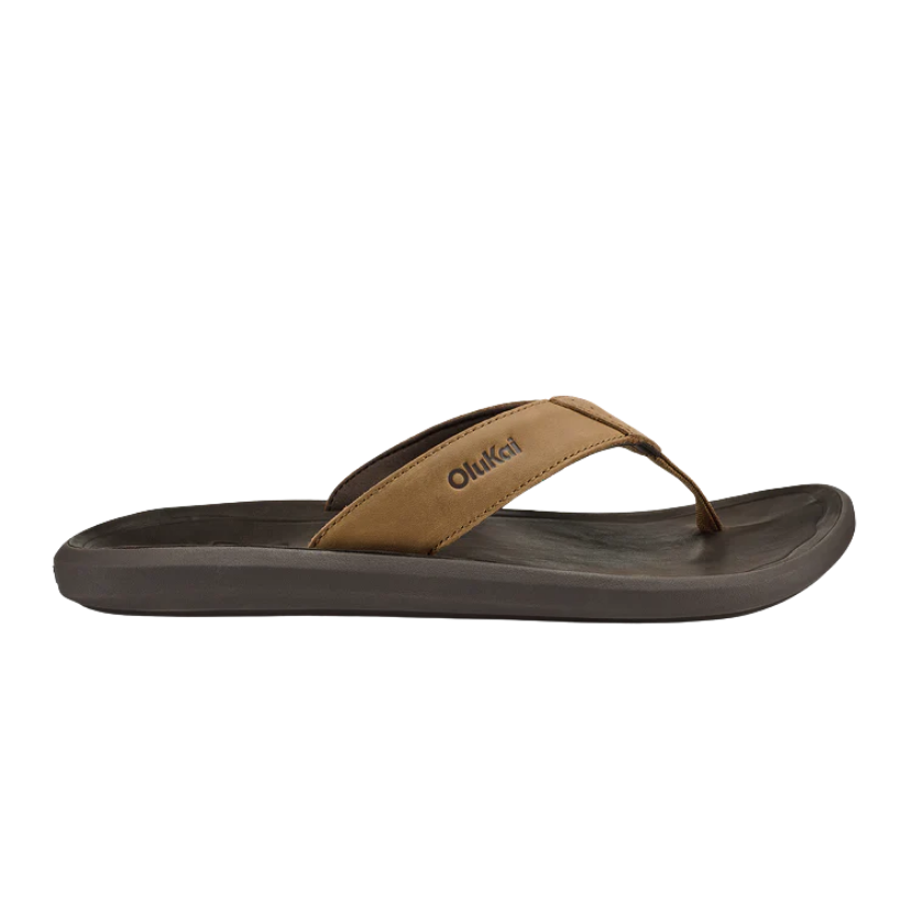 Brown sandal with a Olukai brand logo on a white background