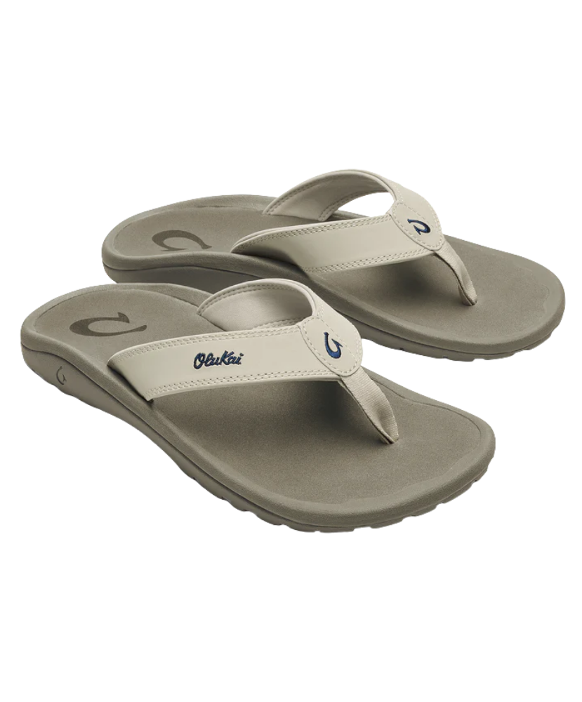 Pair of gray sandals with white straps on a white background