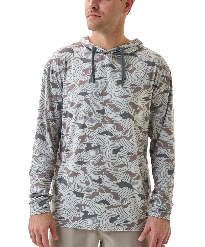 Man wearing a camouflage-patterned BURLEBO hoodie on a white background