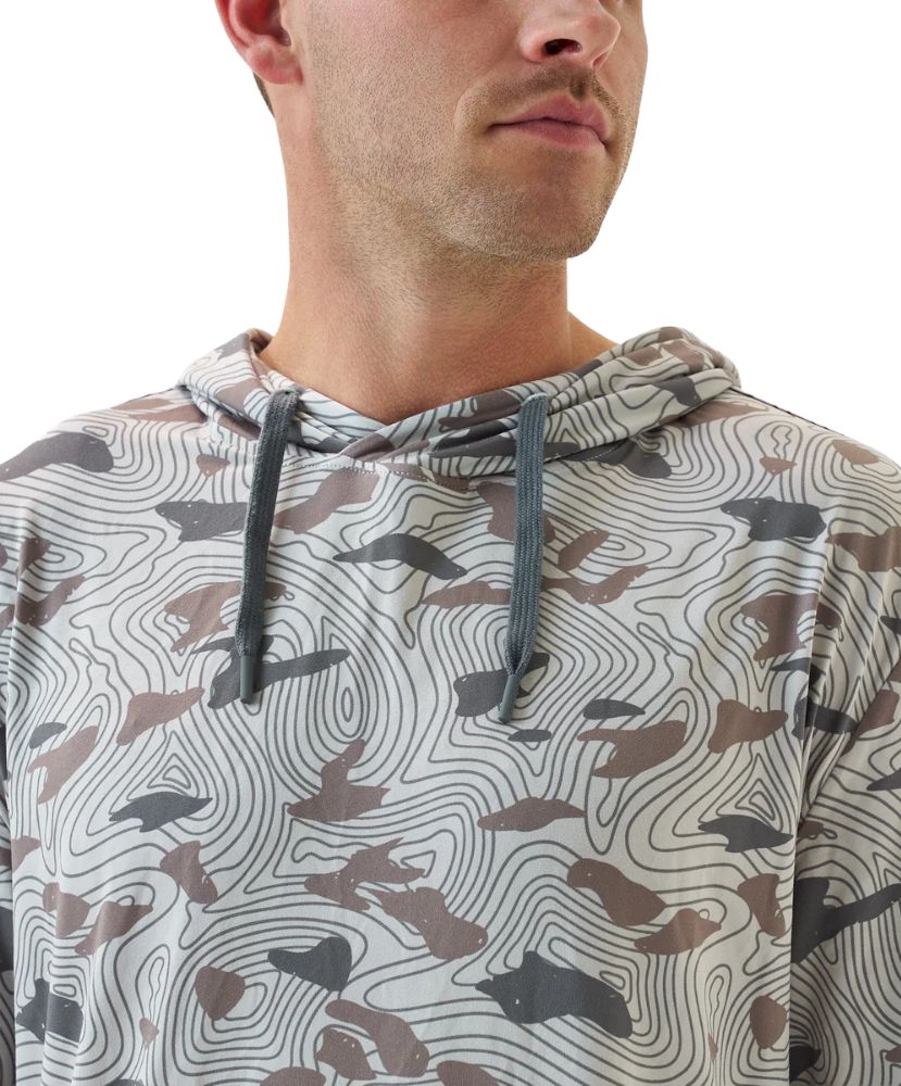 Man wearing a camouflage-patterned BURLEBO hoodie on a white background
