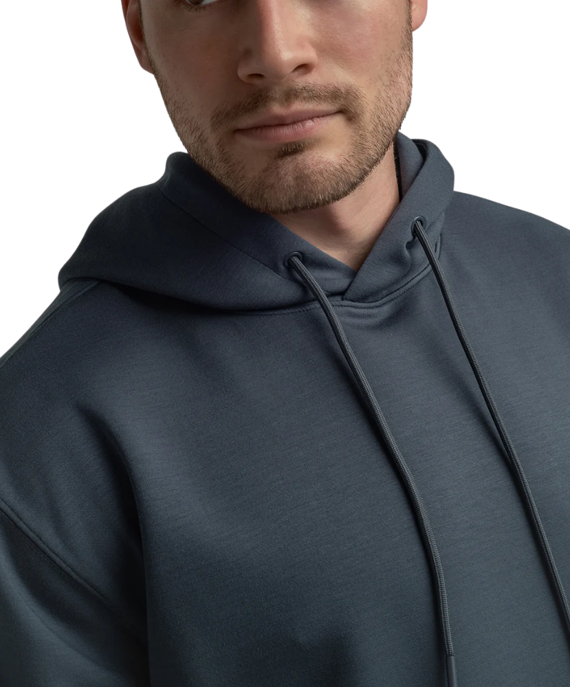 Man wearing a dark blue hoodie on a white background