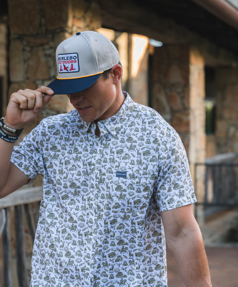 Man wearing a Burlebo cap outdoors