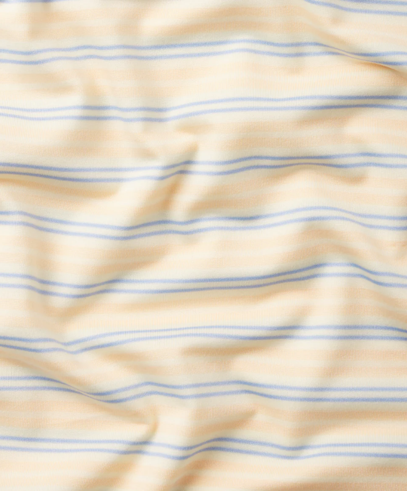 Close-up of YELLOW fabric with blue stripes