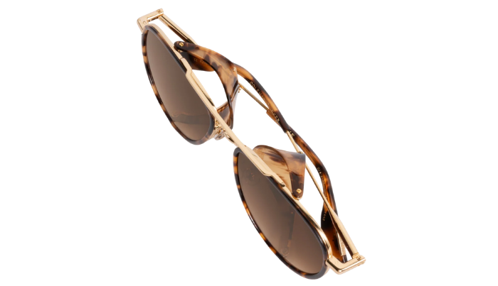 Krewe Sunglasses with tortoiseshell frame and brown lenses on a white background