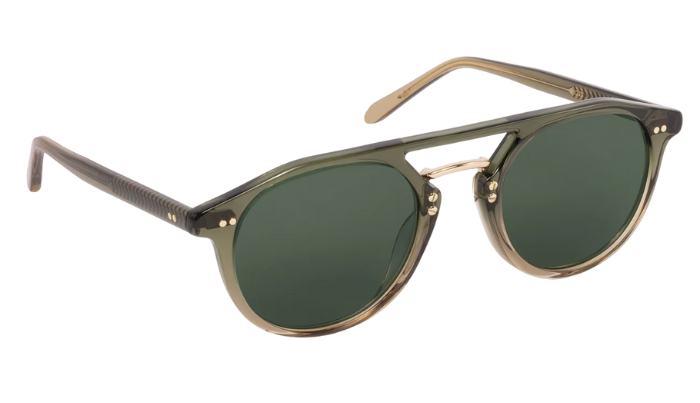 Sunglasses with green lenses and gold frames on a white background