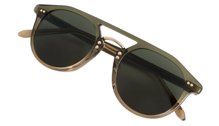 Krewe Sunglasses with gold frame and dark lenses on a white background