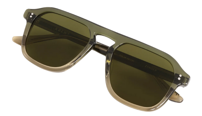 Krewe Sunglasses with dark green lenses and a black frame on a white background
