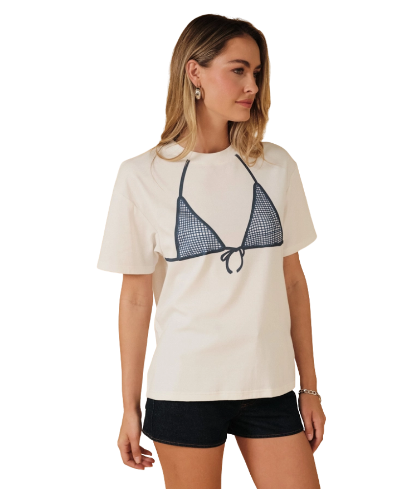 Woman wearing a white t-shirt with a blue bikini top design on a white background