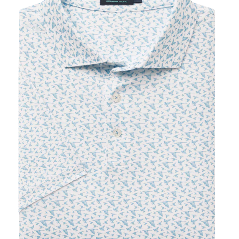 Folded polo shirt with a subtle waterfowl pattern on a white background