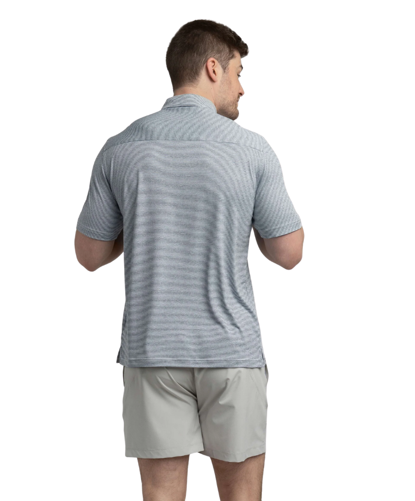 Man wearing a gray striped polo shirt and beige shorts on a white background