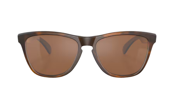 A pair of oversized square sunglasses with a dark brown tortoiseshell frame and warm brown lenses, shown against a plain white background.