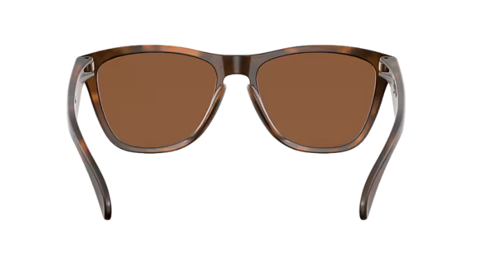A pair of Oakley frogskin sunglasses with a brown tortoiseshell frame and brown tinted lenses, shown from a front-facing perspective on a solid white background.