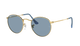 Round sunglasses with gold frame and blue lenses on a white background