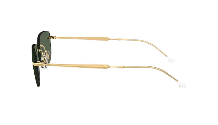 Sunglasses with gold frame and black lenses on a white background