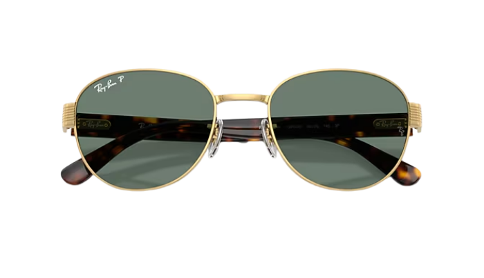 Gold-framed Ray-Ban sunglasses with green lenses on a white background