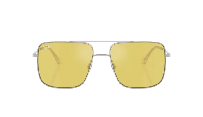 Sunglasses with yellow lenses and silver frame on a white background
