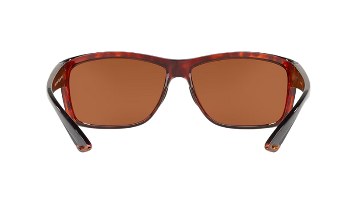 Costa Sunglasses with tortoise frame and green lenses on a white background