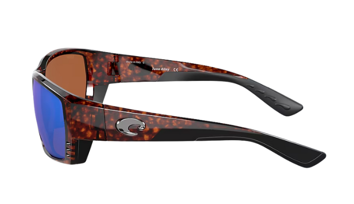 Costa Sunglasses with tortoiseshell frame and green mirror lenses on a white background