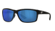 Black Costa sunglasses with blue lenses on a white background
